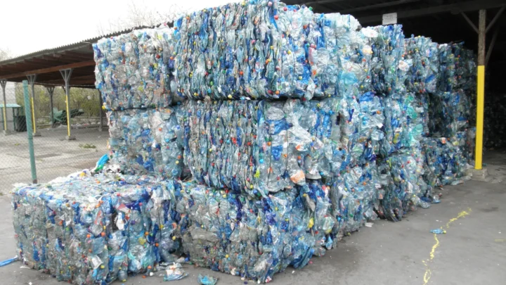 Bales of crushed blue PET bottles at a sorting facility in Olomouc, Czech Republic