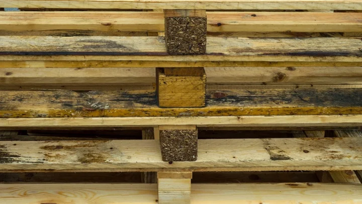 Close view of stacked wooden EUR pallets in Lysekil, Sweden