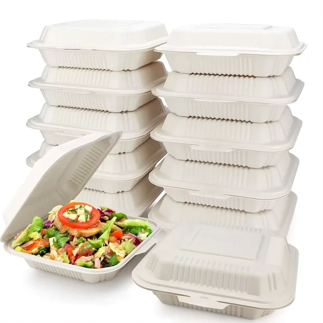 Bioleader white cornstarch clamshell containers displayed in stacks